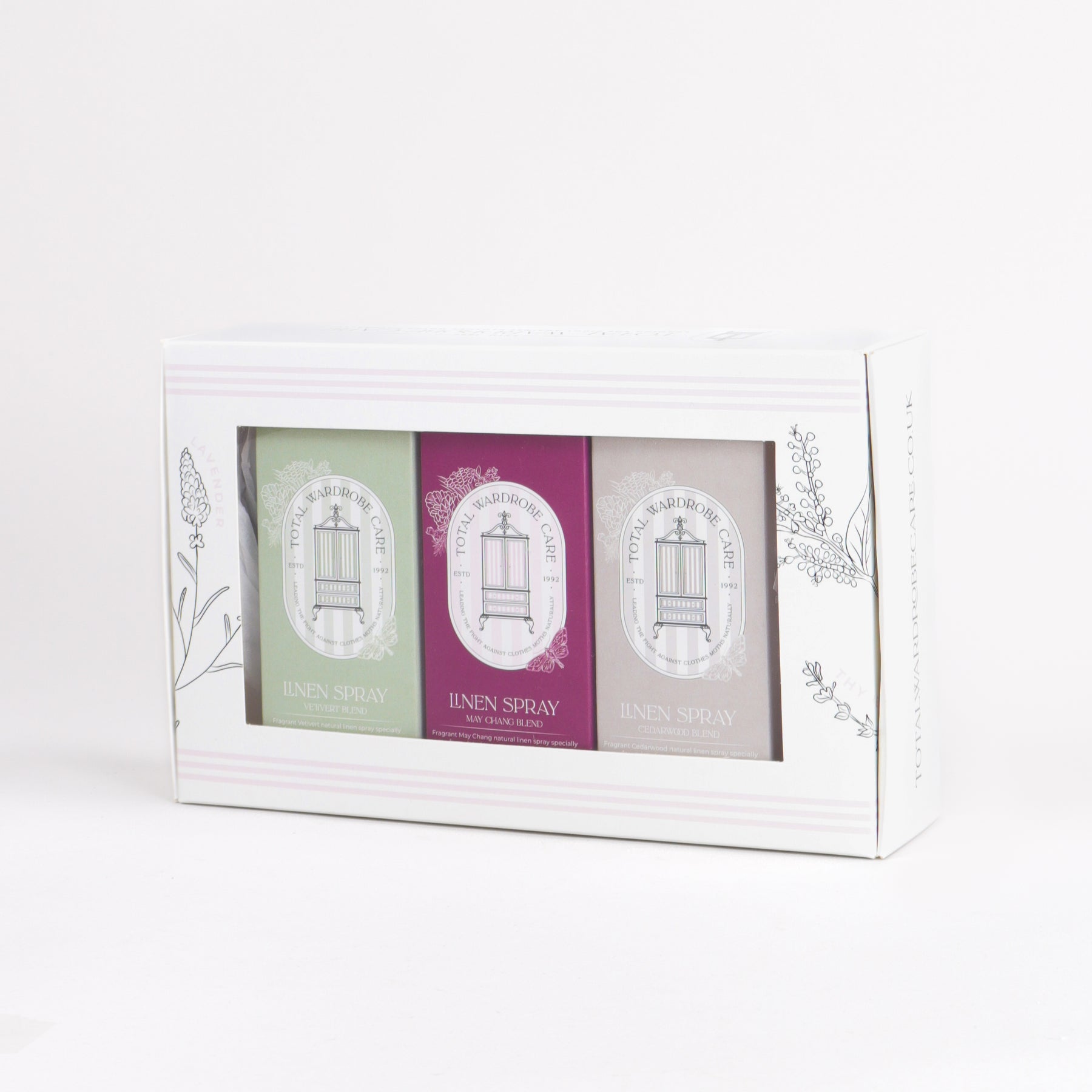 Linen spray trio inside packaging on white background