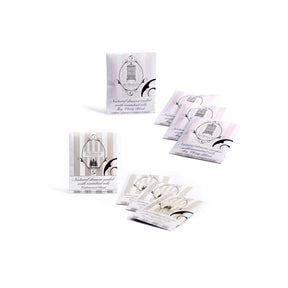 Cedarwood and may chang drawer sachets lined on white background