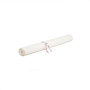 Sealed roll of acid-free tissue paper with pink ribbon with writing on pure white background