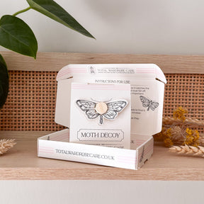 Open moth decoy packaging with moth decoy inside