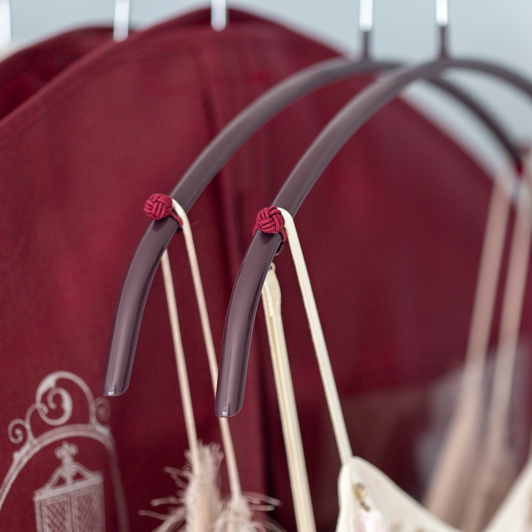Dark red hanger stays on chinese knot hanger