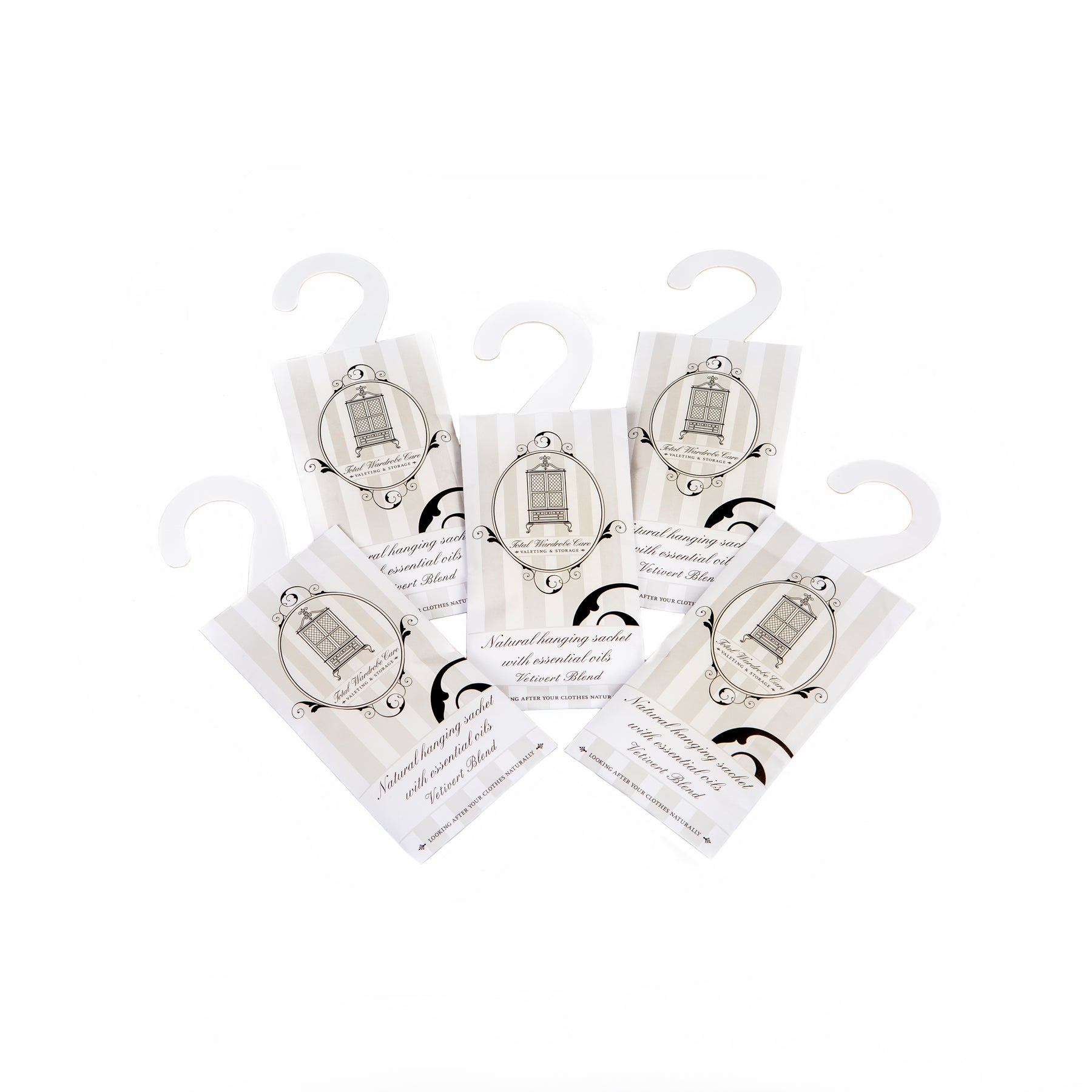 5 laid out vetivert hanging sachets on white background