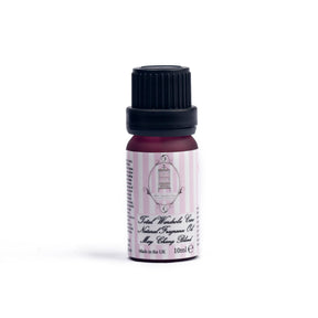 Bottle of may chang essential oil on white background