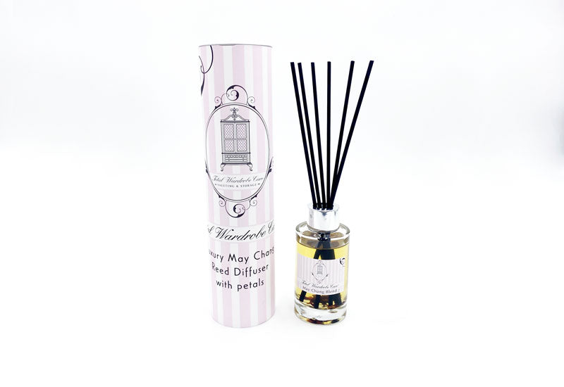 May Chang Reed Diffuser beside pink and white packaging